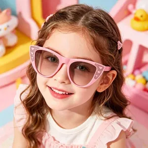 Detailansicht der rosa Katzenaugen-Sonnenbrille für Kinder mit Glitzerherz-Dekor.