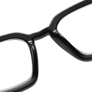 Vista macro detallada del puente liso de las gafas de lectura negras brillantes