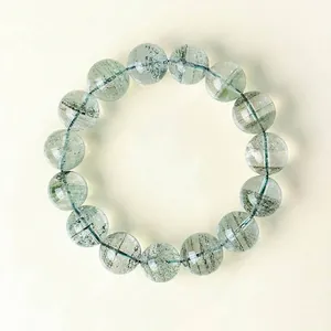 Natural Green Phantom Quartz beaded bracelet featuring unique chlorite phantom inclusions