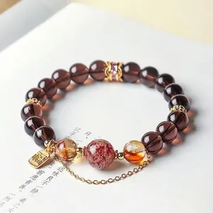 Elegant handcrafted natural ice obsidian and citrine beaded bracelet with gold blessing charm