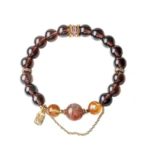 Elegant natural smoky obsidian and citrine beaded bracelet featuring a gold Fu charm