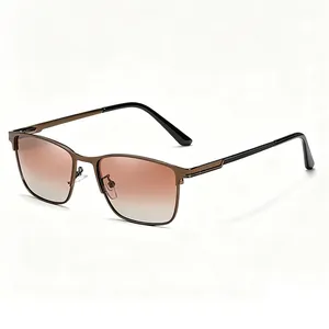 Detail shot of brown metal square frame sunglasses with gradient lenses