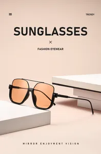 Detail view of square sunglasses with orange lenses and a double-bridge frame design.