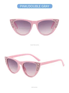 Rosa Cat-Eye-Kindersonnenbrille mit glitzernden Herzdetails und Verlaufsgläsern