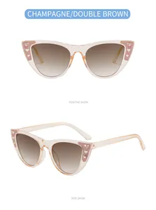 Detail der Champagner Katzenaugen-Kindersonnenbrille mit Glitzerherzen und braunen Gläsern