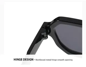 Detalle de cerca de la bisagra de metal reforzada de gafas de sol retro negras.