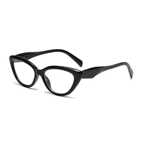 Macro view of vintage cat-eye reading glasses with black frames and clear lenses