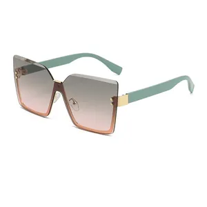 Occhiali da sole squadrati rimless con lenti sfumate e stanghette color verde menta