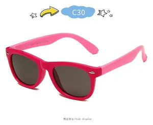 Side view of stylish pink polarized children's sunglasses with a soft silicone frame