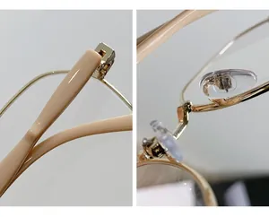 Dettaglio macro della cerniera in metallo e dei naselli in silicone per occhiali