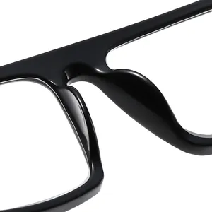 Close-up detail of smooth black bridge and nose pads on square reading glasses