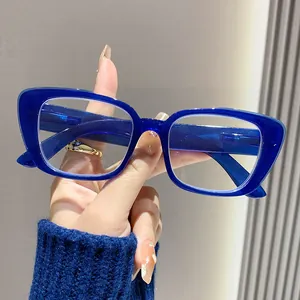 Handheld close-up of stylish retro blue rectangular frames for anti-blue light reading