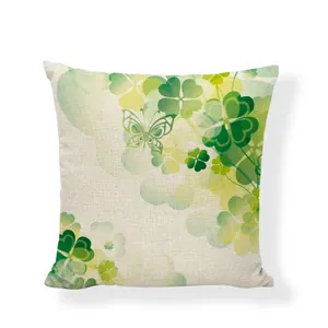 Detailed close-up showing the green four-leaf clover pattern on linen textured pillow case
