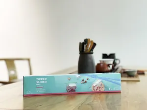 Detail view of XL zipper slider food storage bag packaging in a kitchen setting