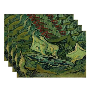 Detailed view of washable linen placemats featuring a Van Gogh style botanical moth print