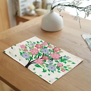 Floral tree pattern linen placemat for dining table decoration, nature-inspired design.