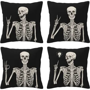 Lot de 4 housses de coussin Halloween avec squelettes en tissu de lin noir et blanc.