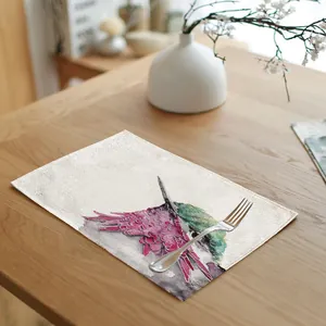 Detailed view of linen placemat featuring a vibrant watercolor hummingbird painting