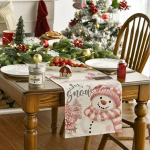 Camino de mesa navideño con muñeco de nieve rosa para decoración festiva