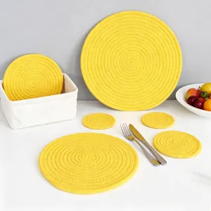 Hand-woven yellow cotton rope insulation placemats and coasters set for kitchen dining table