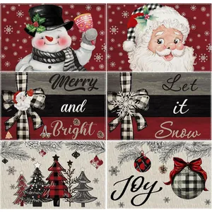 Set of 6 Christmas placemats with festive snowman and Santa designs