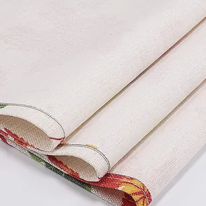 Detailed close-up of a Halloween pumpkin themed cotton linen table runner with weave texture