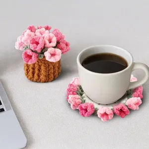Handmade crocheted pink rose flower coaster with a mini potted bouquet ornament