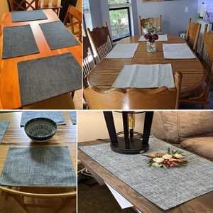 Sets de table gris tissés résistants à la chaleur sur diverses tables de salle à manger