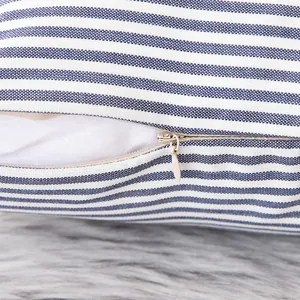 Close-up of blue striped cotton linen pillowcase with invisible zipper detail.