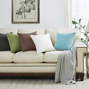 Cozy corduroy pillow covers in multiple colors styled on a modern living room sofa.