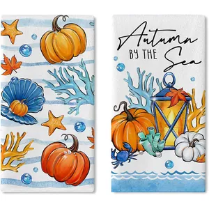 Decorative Autumn Sea kitchen towels featuring pumpkins and nautical elements for Thanksgiving