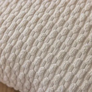 Close-up of cream short strip corduroy texture for modern minimalist pillow cover