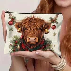 Festive Christmas Highland cow linen cosmetic bag with holiday wreath print and zipper