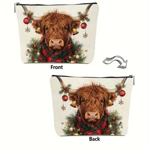 Highland cow Christmas makeup bag with festive wreath and red scarf print.
