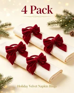 Set of 4 red velvet bow napkin rings for elegant holiday table decor settings.