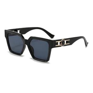 Fashionable black square oversized sunglasses with unique gold metal temple design