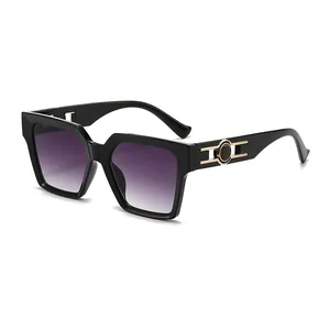 High-end black square frame sunglasses with gradient lenses and gold temple decor
