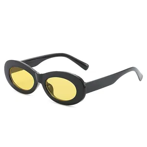 Lunettes de soleil tendance vintage œil de chat ovales pour femmes monture noire et jaune