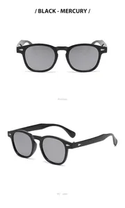 Retro round frame sunglasses in black with mercury lenses and metallic rivet detail