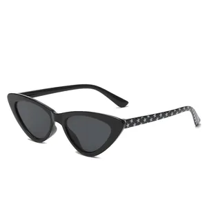 Stylish black cat-eye sunglasses for kids featuring white star pattern temples.
