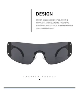 Detail of Y2K shield sunglasses with silver star studs and futuristic rimless lenses.