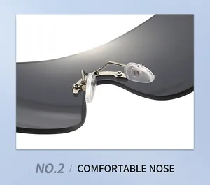 Close-up detail of the adjustable silicone nose pads on rimless Y2K shield sunglasses.