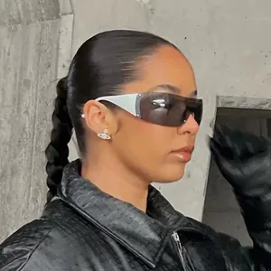 Futuristic Y2K wraparound sunglasses for women with gray lenses and white frames