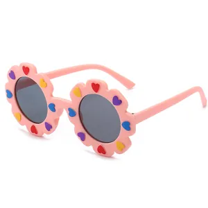 Occhiali da sole rosa per bambini a forma di girasole con motivi a cuore colorati