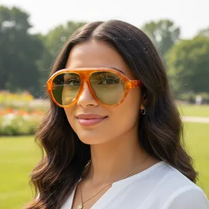 Close-up of a female model wearing oversized amber frame Cyberpunk Y2K sunglasses outdoors