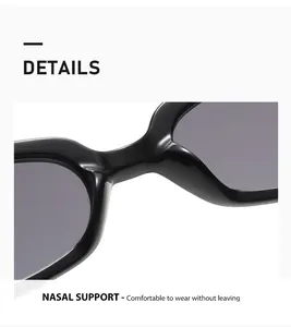 Detalle macro del cómodo soporte nasal integrado en la montura negra de gafas de sol gato