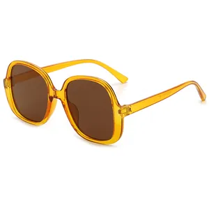 Lunettes de soleil carrées rétro surdimensionnées avec monture ambre transparente chic