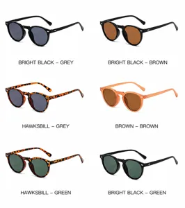 Vintage-inspired round sunglasses featuring metal rivets in various color options