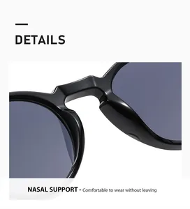 Detailed macro view of the ergonomic nasal support on vintage black frame sunglasses