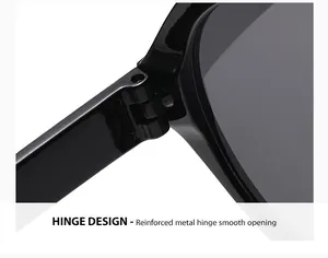 Close-up view of the reinforced metal hinge on these black cyberpunk Y2K sunglasses